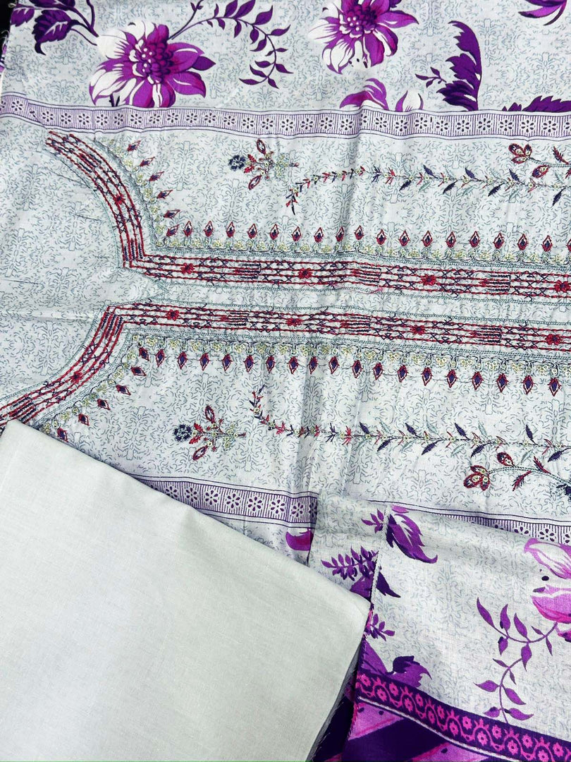 Elegant Floral Embroidered Fabric with Purple Accents